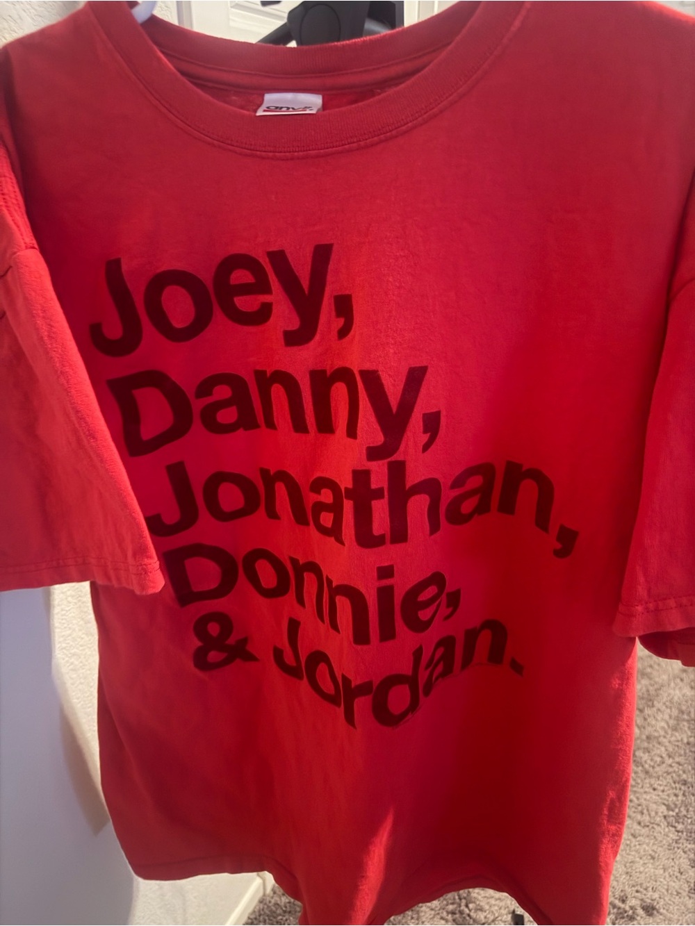 Source Unknown Red Short Sleeve Tee with Stacked Names Graphic